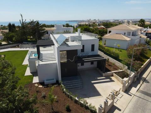 Villa T4 Nueva - Acabados de lujo - Vista al mar - Piscina climatizada - Ferragudo - Algarve